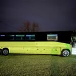 Exterior view of 50-passenger luxury party bus at night – Brantford Limo Service.